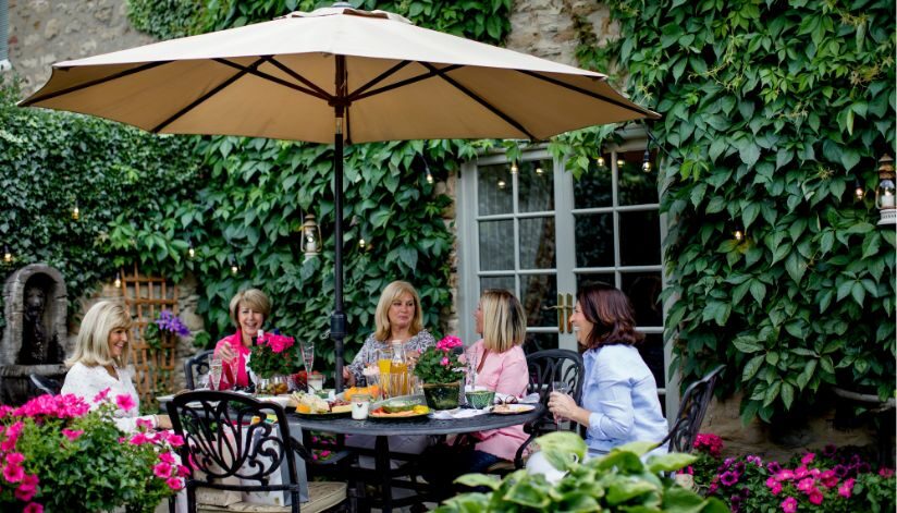 drugans-castle-mound-why-outdoor-dining-changes-how-people-go-out-group-women-on-patio