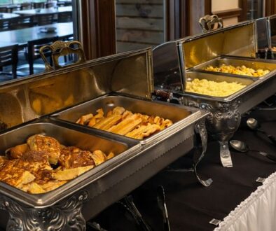 Drugan’s Castle Mound's breakfast buffet displays French toast, bacon, scrambled eggs, and other hot foods.